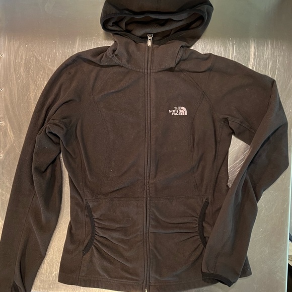 North face Small, embossed pattern, black fleece, front pockets with hood. - Picture 2 of 15